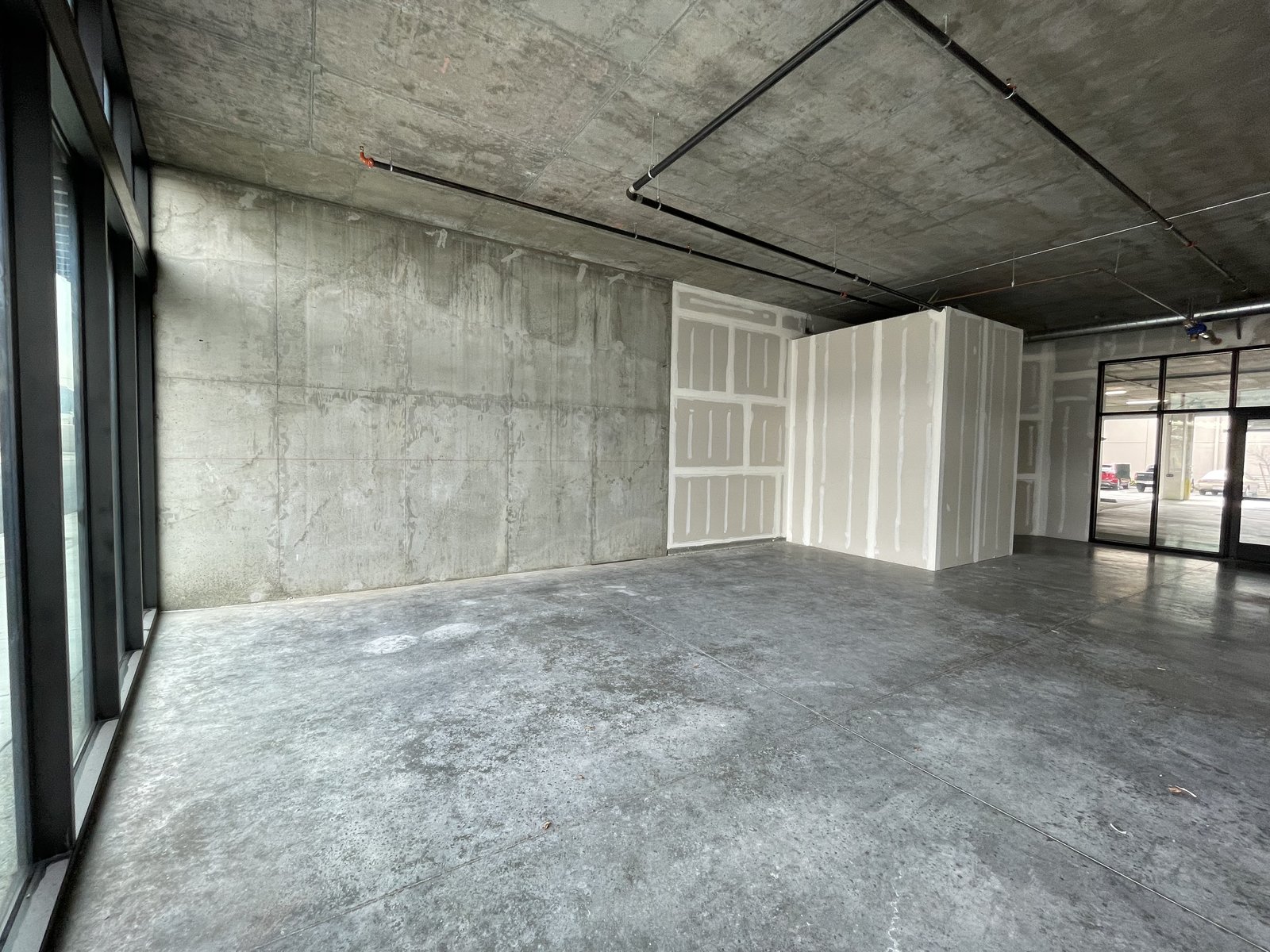 Generation Golf space before build — raw concrete